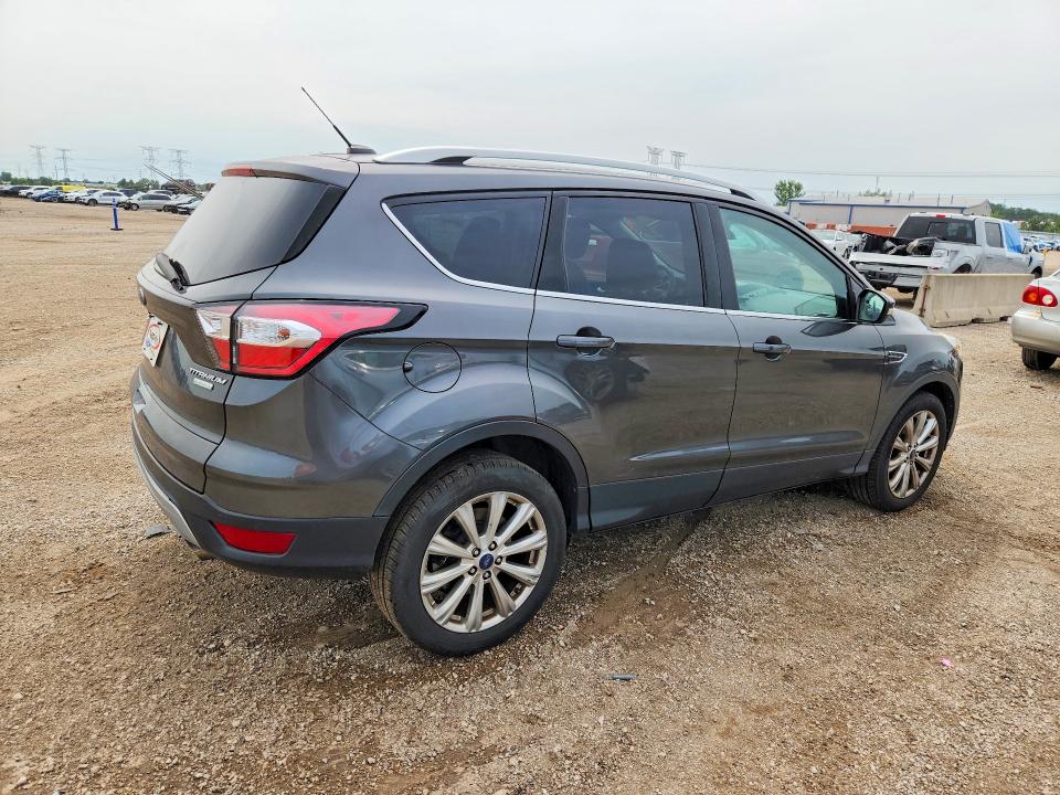 2017 Ford Escape მანქანა იყიდება აუქციონზე, vin: 1FMCU0JD6HUE31123, აუქციონის ნომერი: 64611036