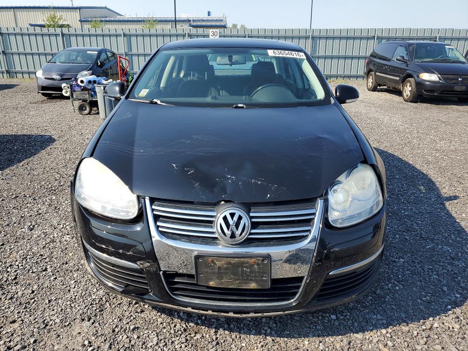 2009 Volkswagen Jetta მანქანა იყიდება აუქციონზე, vin: 3VWHM71K29M147928, აუქციონის ნომერი: 63654616