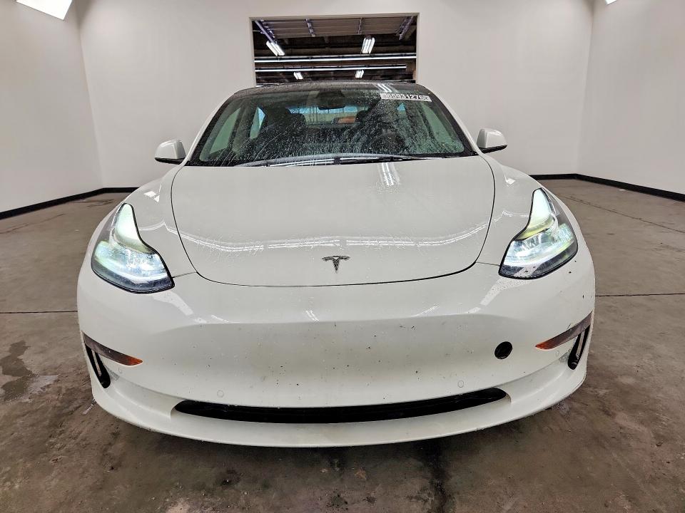 65931276 :رقم المزاد ، 5YJ3E1EAXNF288205 vin ، 2022 Tesla Model 3 مزاد بيع