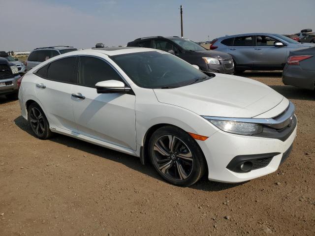 68609934 :رقم المزاد ، 2HGFC1F9XHH104856 vin ، 2017 Honda Civic Tour مزاد بيع