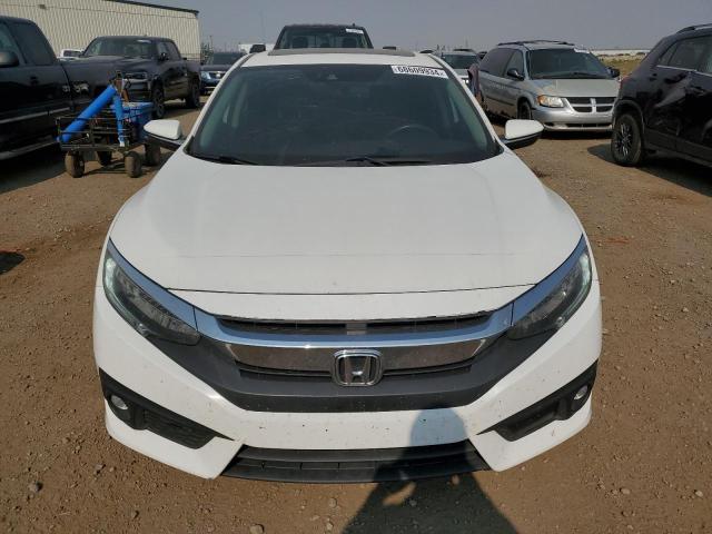 68609934 :رقم المزاد ، 2HGFC1F9XHH104856 vin ، 2017 Honda Civic Tour مزاد بيع