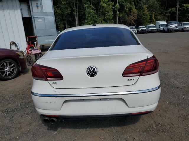 82026665 :رقم المزاد ، WVWBP7AN9DE559854 vin ، 2013 Volk Cc Sport مزاد بيع