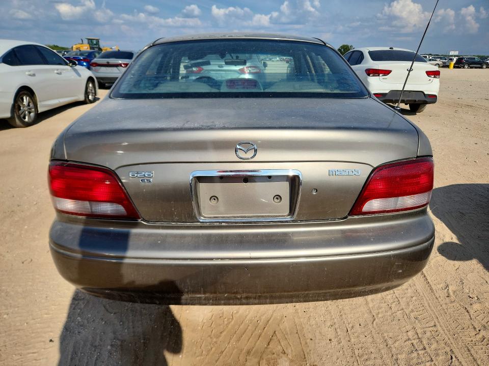 69789846 :رقم المزاد ، 1YVGF22C7X5893503 vin ، 1999 Mazda 626 مزاد بيع