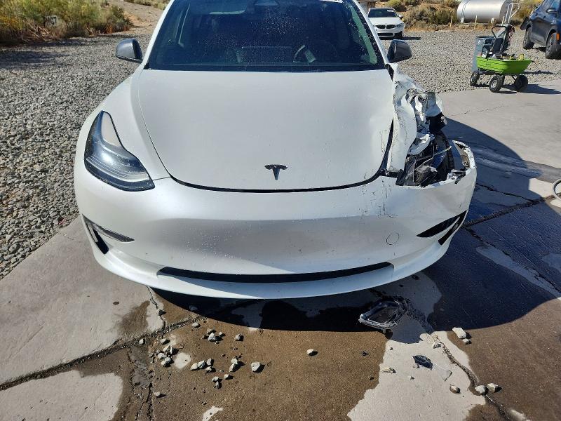 Продажа на аукционе авто 2022 Tesla Model 3, vin: 5YJ3E1EC6NF295380, номер лота: 68879366