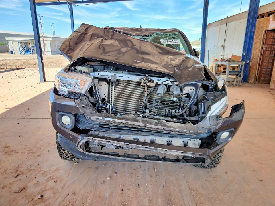 69748406 :رقم المزاد ، 5TFSZ5AN9GX034820 vin ، 2016 Toyota Tacoma مزاد بيع