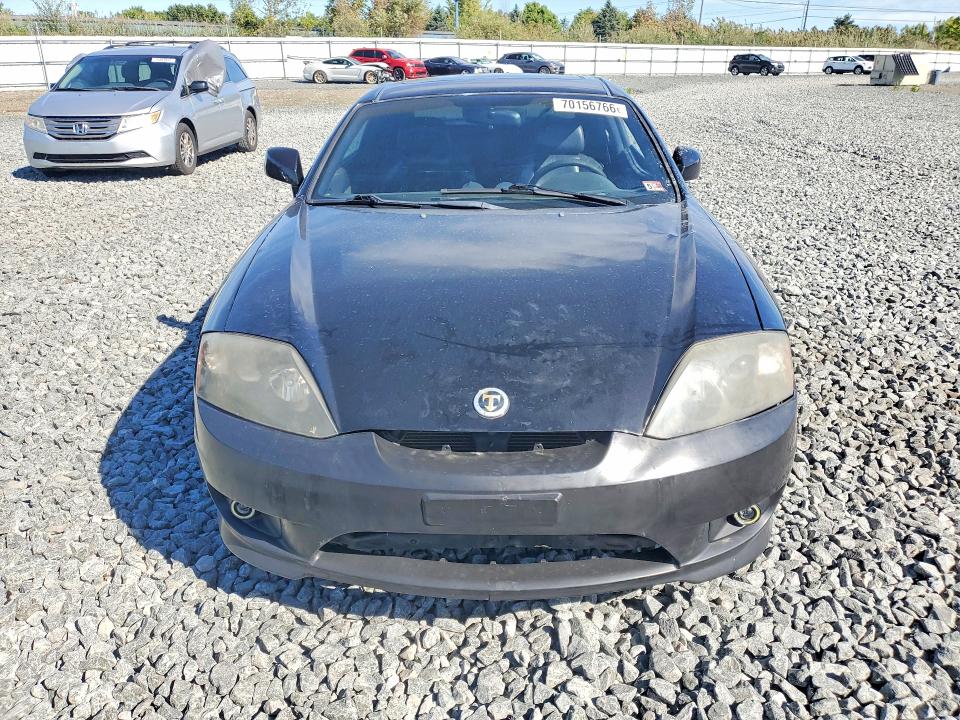2003 Hyundai Tiburon მანქანა იყიდება აუქციონზე, vin: KMHHN65F33U018652, აუქციონის ნომერი: 70156766