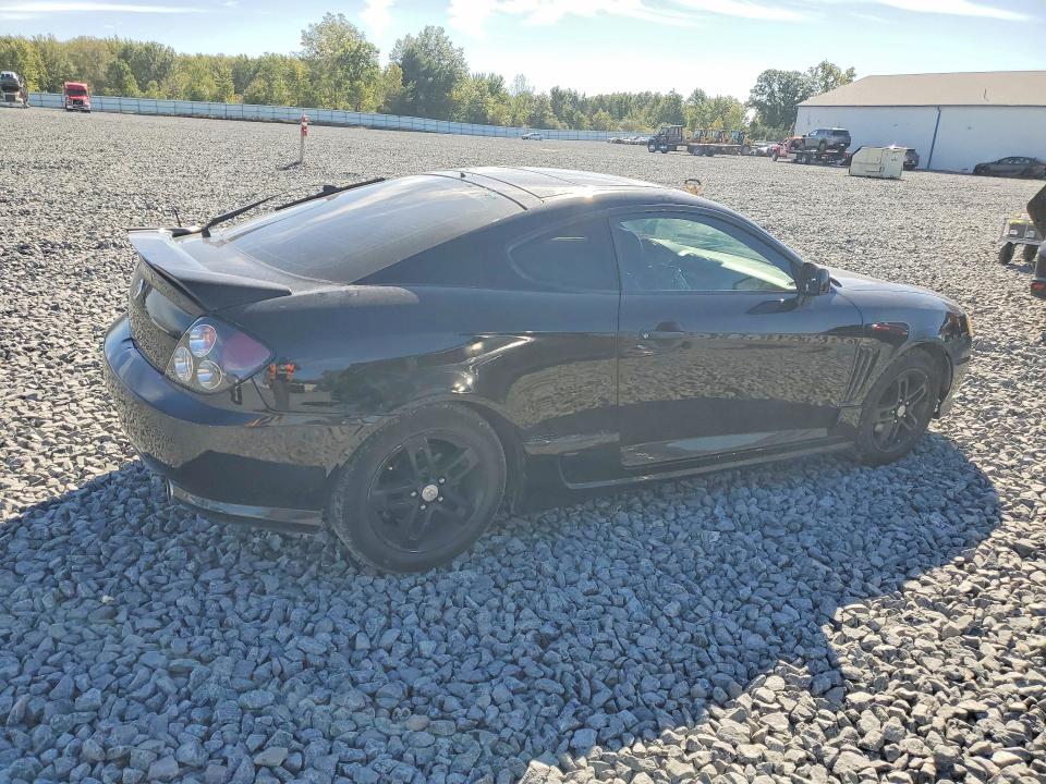 2003 Hyundai Tiburon მანქანა იყიდება აუქციონზე, vin: KMHHN65F33U018652, აუქციონის ნომერი: 70156766