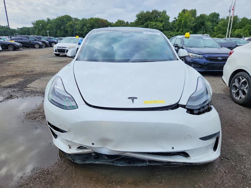 66410046 :رقم المزاد ، 5YJ3E1EA3MF043812 vin ، 2021 Tesla Model 3 مزاد بيع