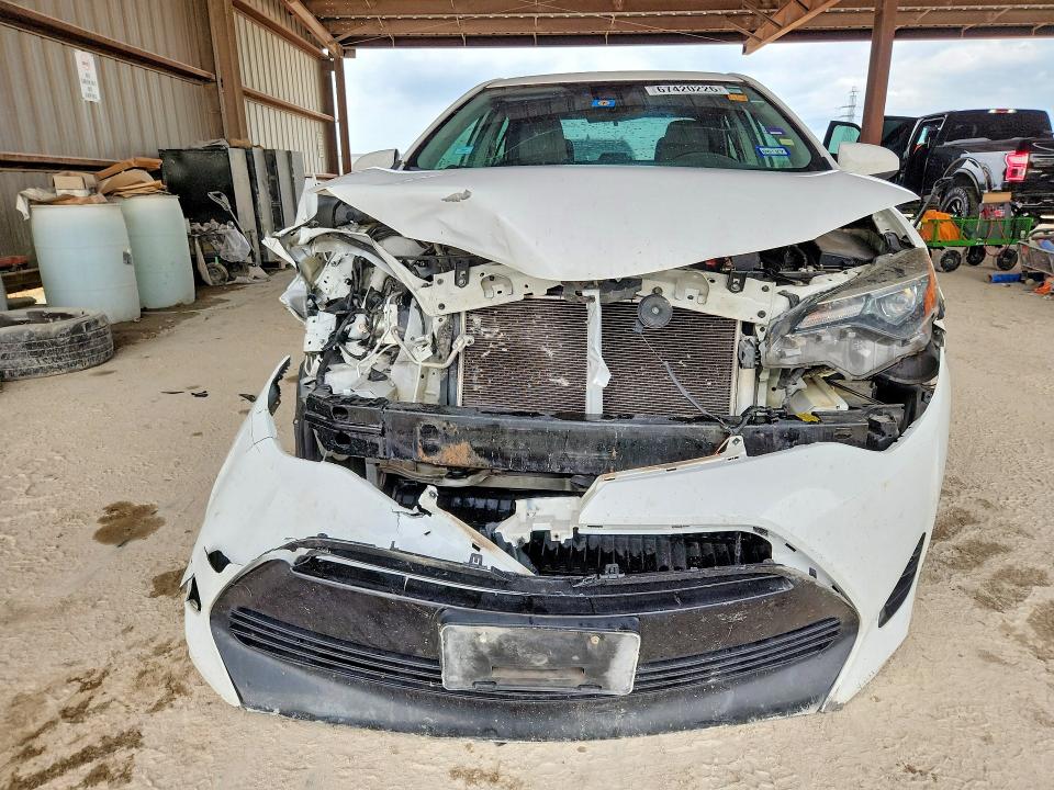 67420226 :رقم المزاد ، 5YFBURHE9JP855921 vin ، 2018 Toyota Corolla مزاد بيع