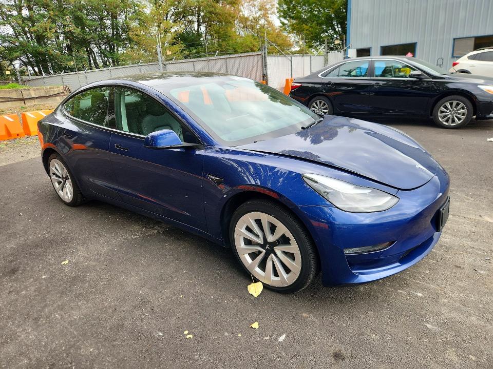 Продажа на аукционе авто 2022 Tesla Model 3, vin: 5YJ3E1EA1NF303884, номер лота: 69987436