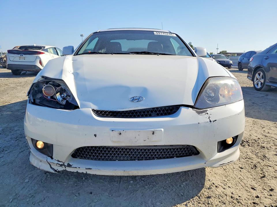 2006 Hyundai Tiburon მანქანა იყიდება აუქციონზე, vin: KMHHN65F86U216549, აუქციონის ნომერი: 69745246