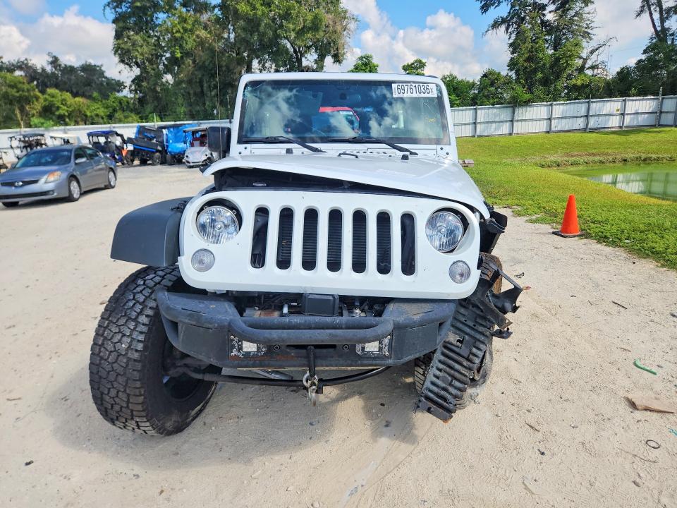 2016 Jeep Wrangler Unlimited მანქანა იყიდება აუქციონზე, vin: 1C4BJWDG4GL265321, აუქციონის ნომერი: 69761036