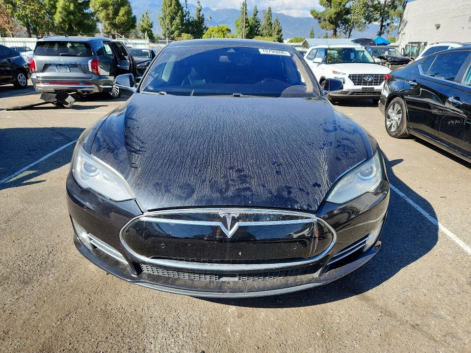 Продажа на аукционе авто 2015 Tesla Model S, vin: 5YJSA1H28FF082636, номер лота: 70790896