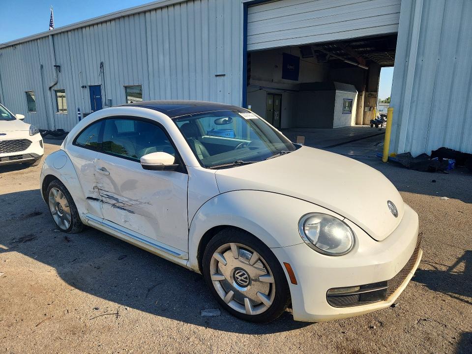 69774606 :رقم المزاد ، 3VWHP7AT6CM638431 vin ، 2012 Volkswagen Beetle مزاد بيع