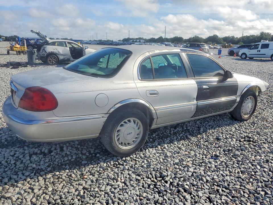 67711326 :رقم المزاد ، 1LNFM97V1WY694854 vin ، 1998 Lincoln Continental مزاد بيع