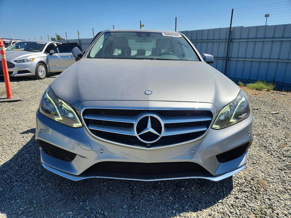 69808356 :رقم المزاد ، WDDHF5KB3EA870135 vin ، 2014 Mercedes-benz E مزاد بيع