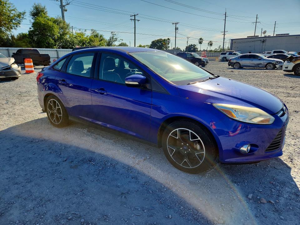 Auction sale of the 2014 Ford Focus, vin: 1FADP3F22EL165907, lot number: 70770116
