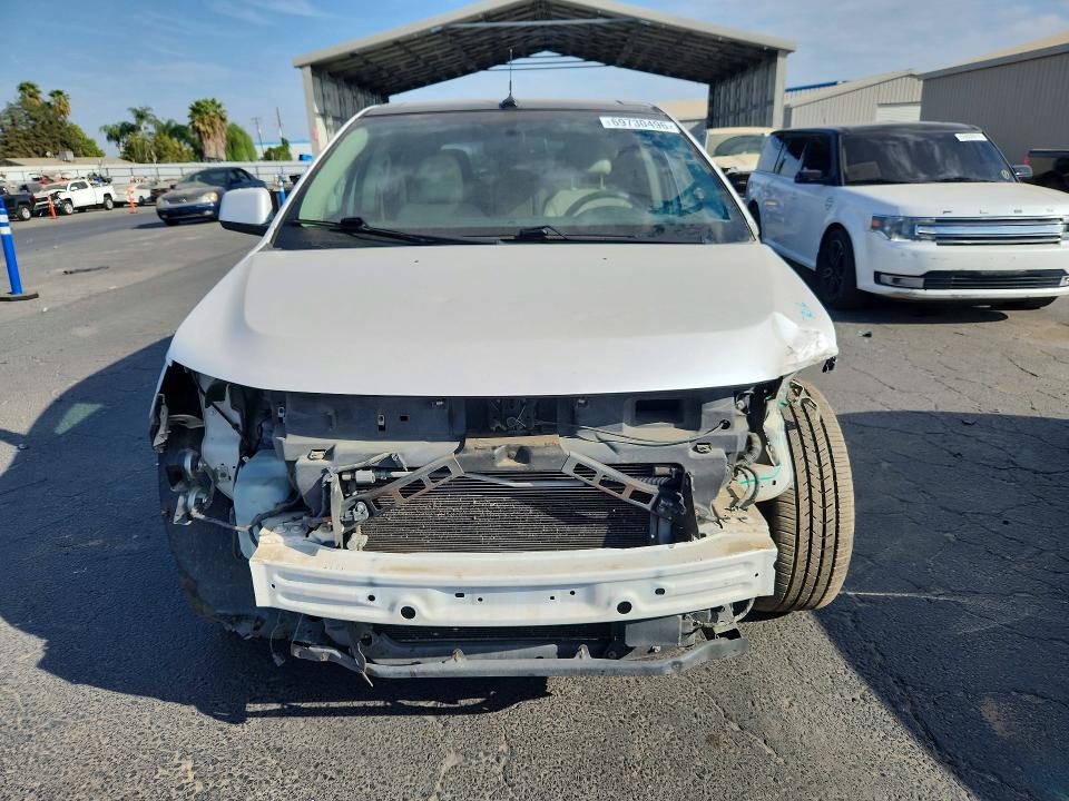 69730496 :رقم المزاد ، 2FMDK4KCXBBA71505 vin ، 2011 Ford Edge مزاد بيع