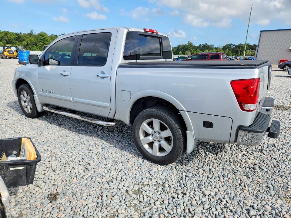 69103206 :رقم المزاد ، 1N6BA0EC0AN310286 vin ، 2010 Nissan Titan مزاد بيع