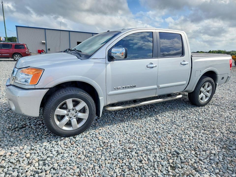 69103206 :رقم المزاد ، 1N6BA0EC0AN310286 vin ، 2010 Nissan Titan مزاد بيع