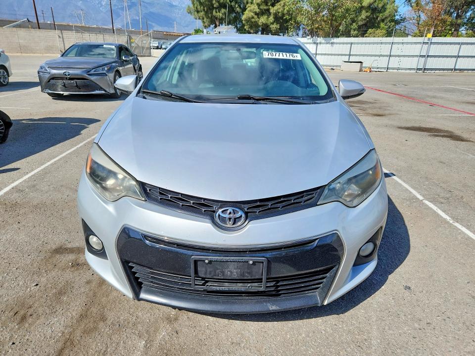 70771176 :رقم المزاد ، 5YFBURHE8EP138657 vin ، 2014 Toyota Corolla مزاد بيع