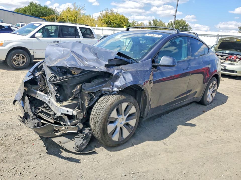 Auction sale of the 2023 Tesla Model Y, vin: 7SAYGAEE2PF865561, lot number: 68094076