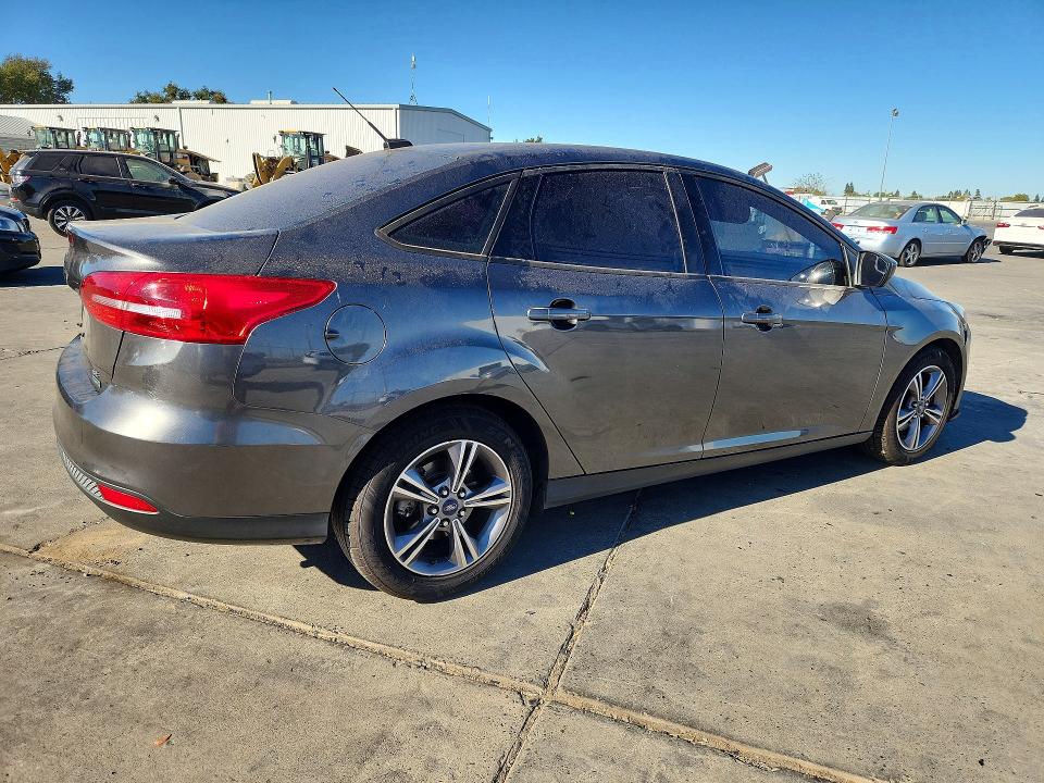 Продажа на аукционе авто 2018 Ford Focus, vin: 1FADP3FE2JL288059, номер лота: 70937816