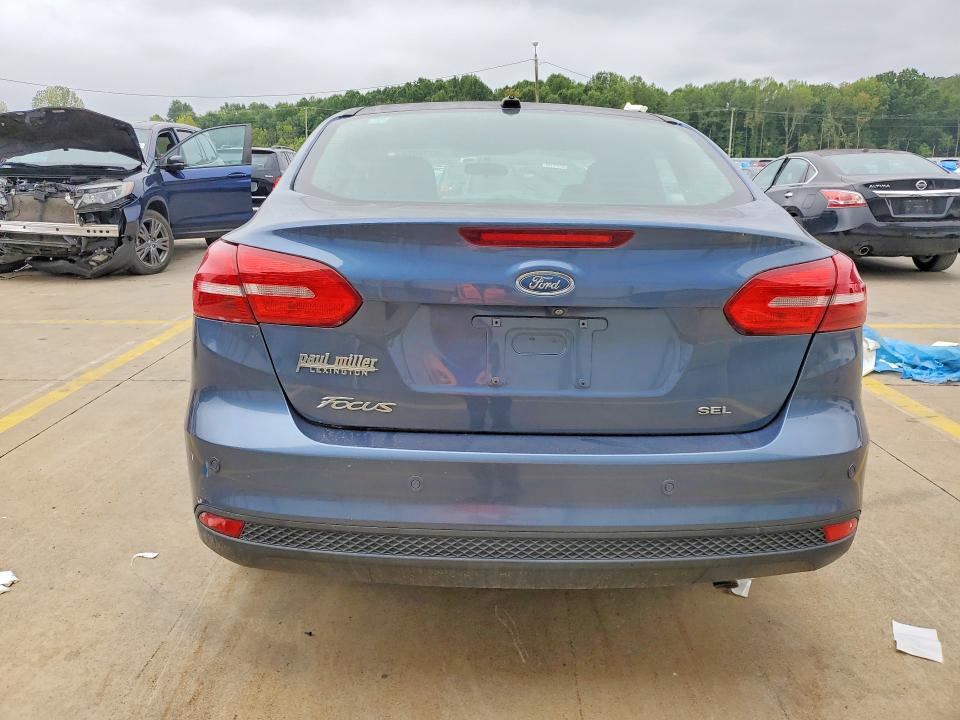 69774076 :رقم المزاد ، 1FADP3H29JL276882 vin ، 2018 Ford Focus مزاد بيع