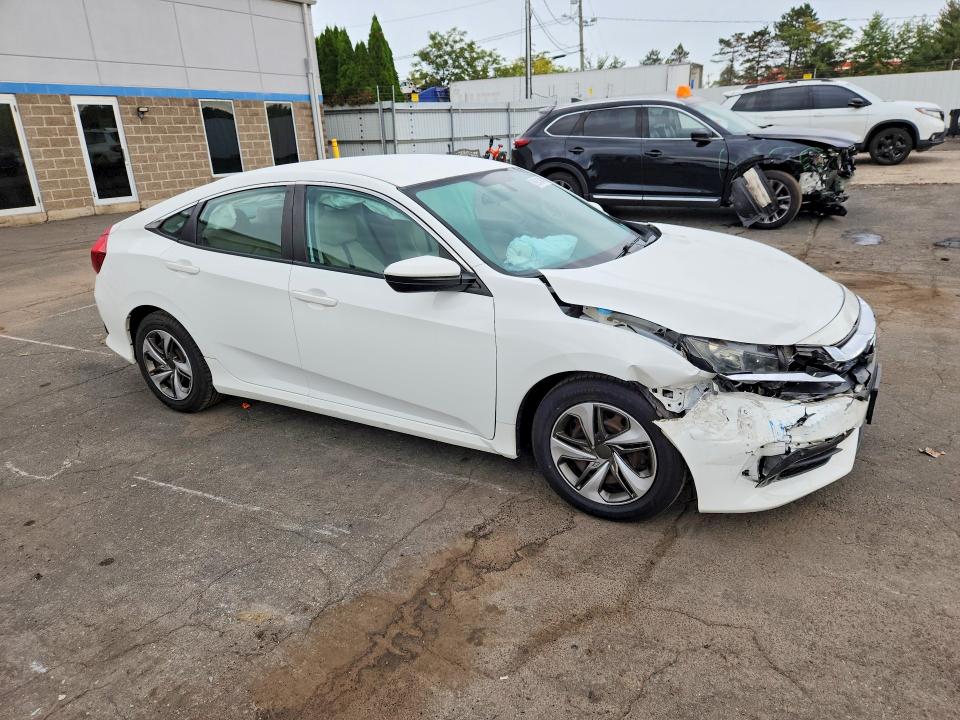 69243946 :رقم المزاد ، 19XFC2F57GE205560 vin ، 2016 Honda Civic مزاد بيع