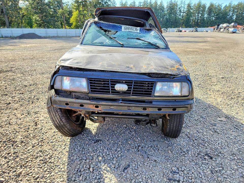 1993 Geo Tracker მანქანა იყიდება აუქციონზე, vin: 2CNBJ18UXP6935073, აუქციონის ნომერი: 69959236