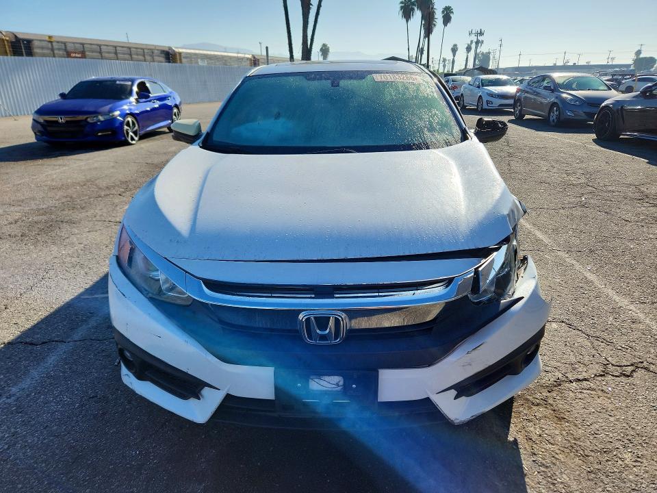Продажа на аукционе авто 2018 Honda Civic, vin: JHMFC1F34JX039013, номер лота: 70183286