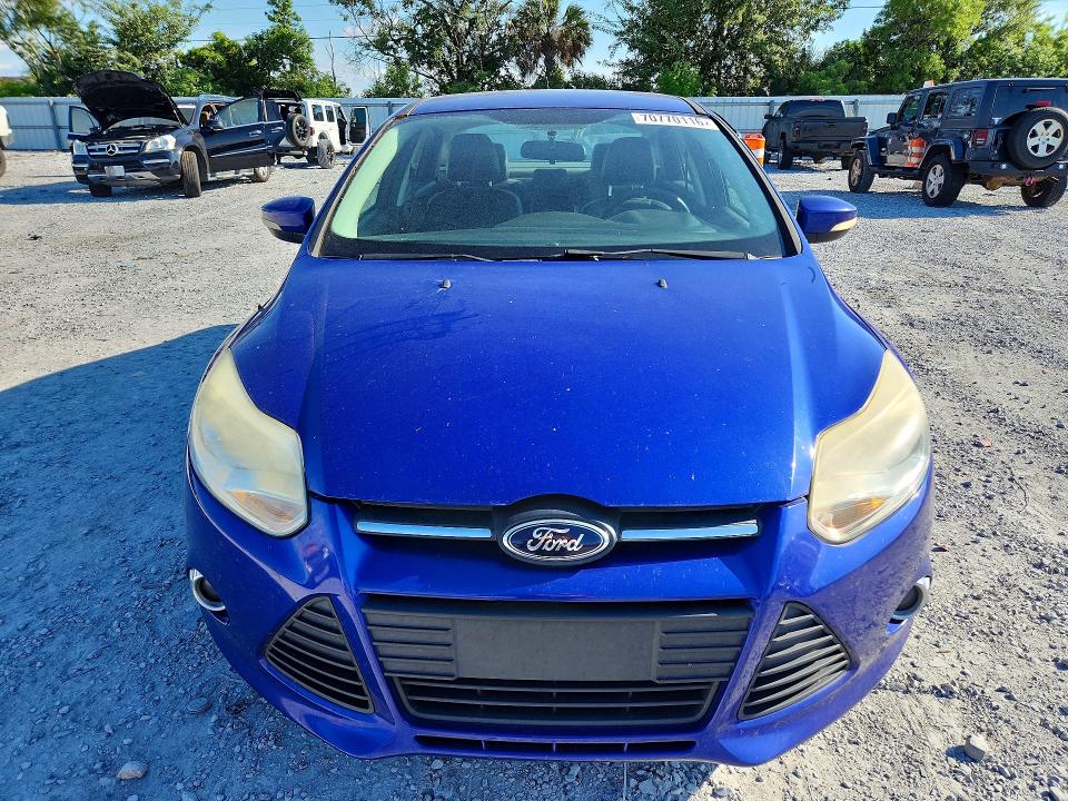 Auction sale of the 2014 Ford Focus, vin: 1FADP3F22EL165907, lot number: 70770116