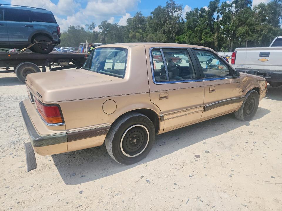 69419596 :رقم المزاد ، 1B3BA56J9KF464277 vin ، 1989 Dodge Spirit مزاد بيع
