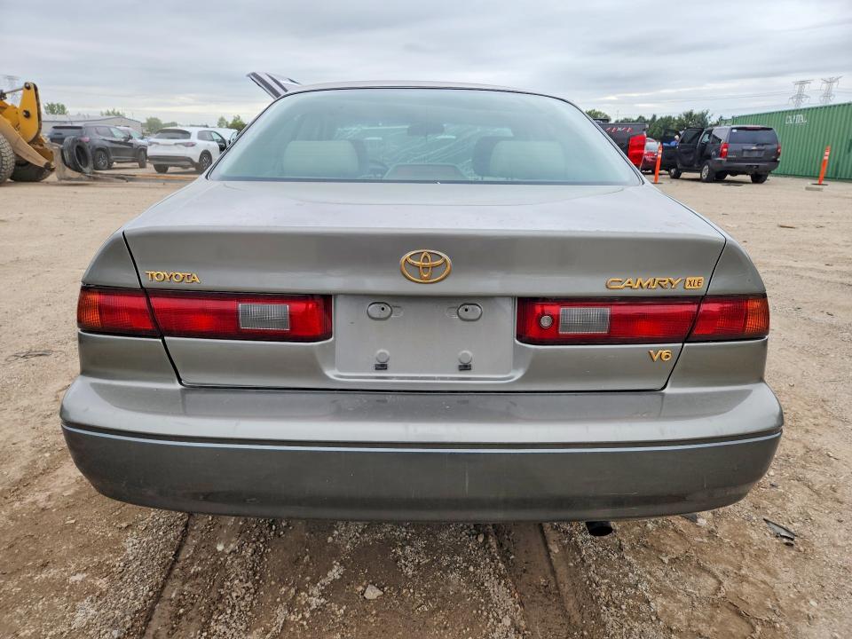 69103726 :رقم المزاد ، JT2BF28KXX0161970 vin ، 1999 Toyota Camry مزاد بيع