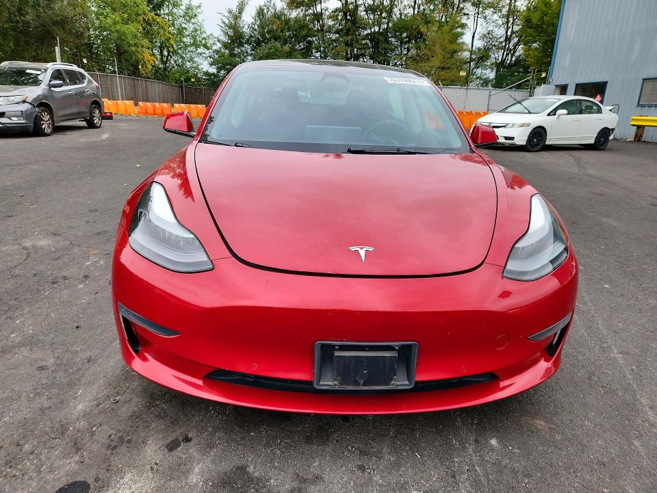 Продажа на аукционе авто 2022 Tesla Model 3, vin: 5YJ3E1EA1NF303822, номер лота: 69921796