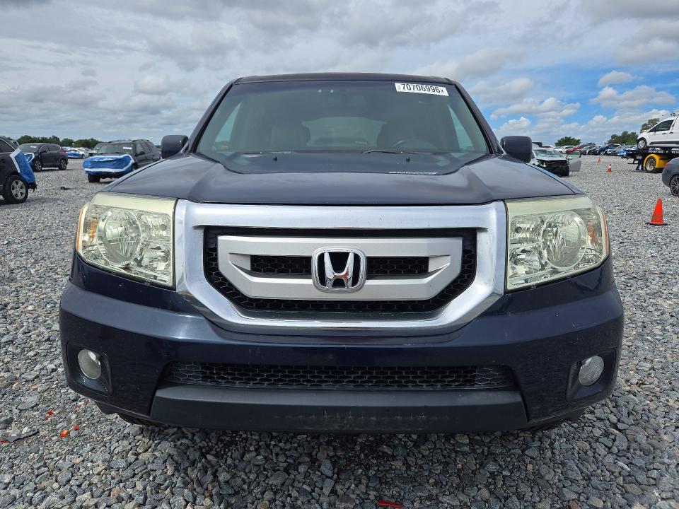 70706996 :رقم المزاد ، 5FNYF4H51BB030556 vin ، 2011 Honda Pilot مزاد بيع