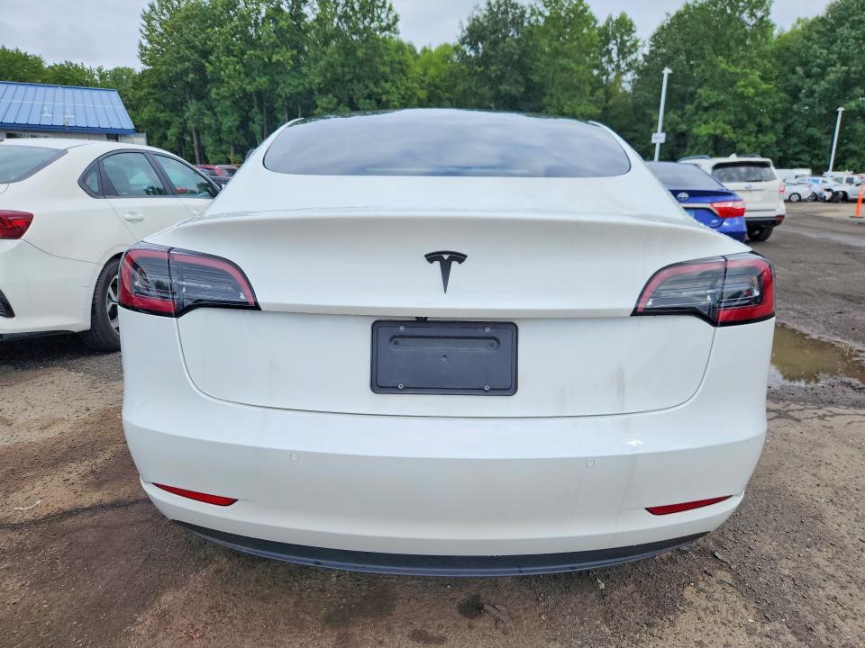 66410046 :رقم المزاد ، 5YJ3E1EA3MF043812 vin ، 2021 Tesla Model 3 مزاد بيع