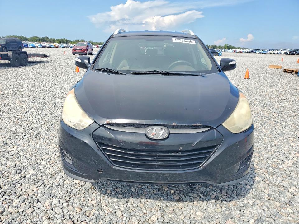 2012 Hyundai Tucson მანქანა იყიდება აუქციონზე, vin: KM8JUCAC6CU518318, აუქციონის ნომერი: 69985666