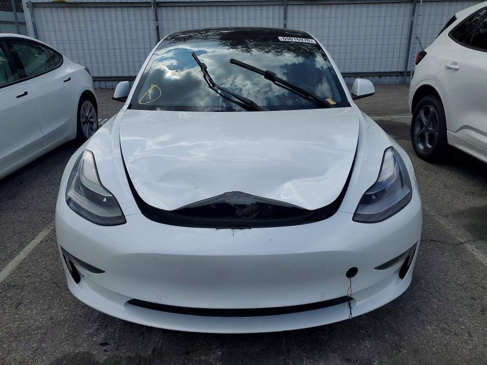 65016976 :رقم المزاد ، 5YJ3E1EA2MF002782 vin ، 2021 Tesla Model 3 مزاد بيع