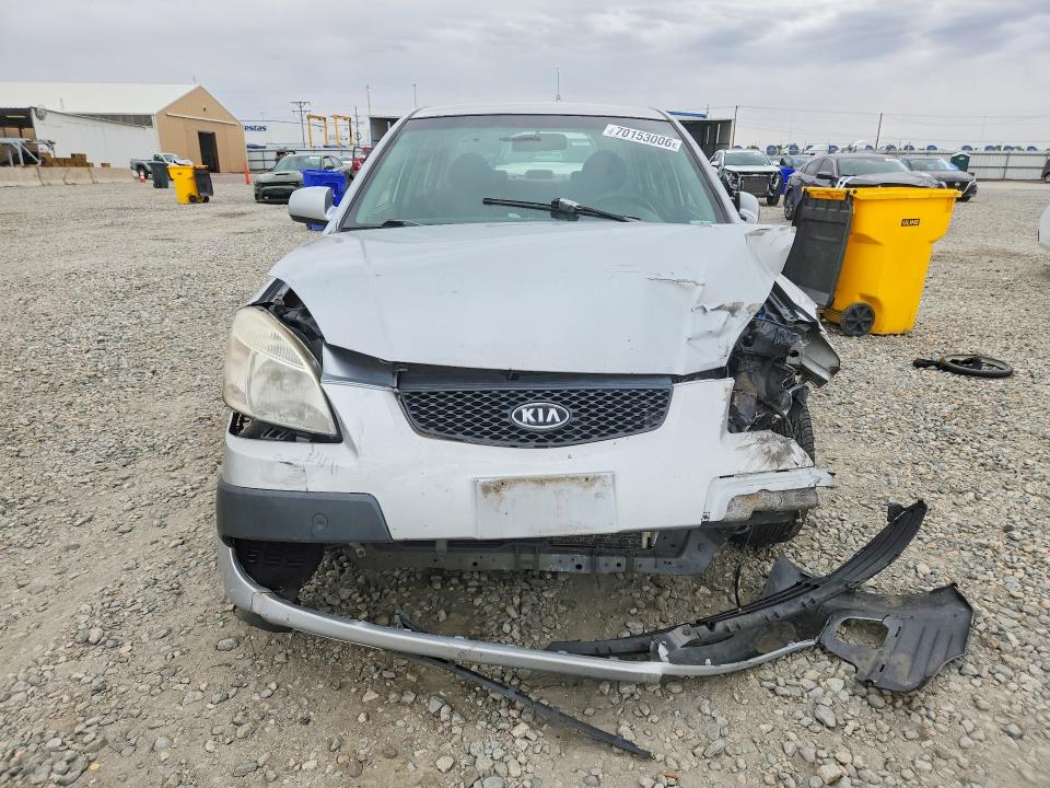 70153006 :رقم المزاد ، KNADE223796495570 vin ، 2009 Kia Rio مزاد بيع