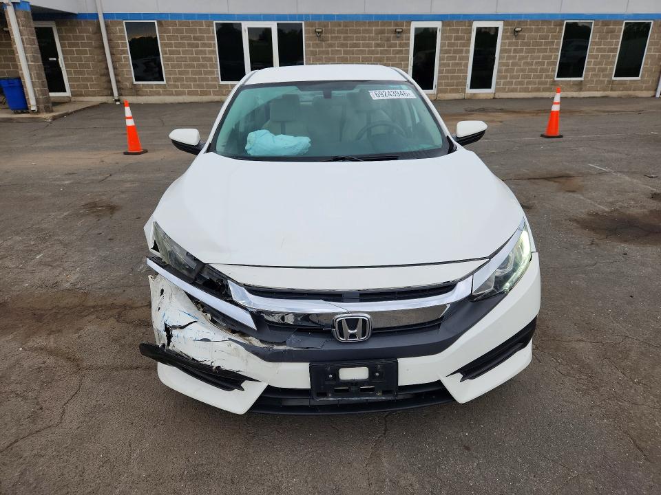 69243946 :رقم المزاد ، 19XFC2F57GE205560 vin ، 2016 Honda Civic مزاد بيع
