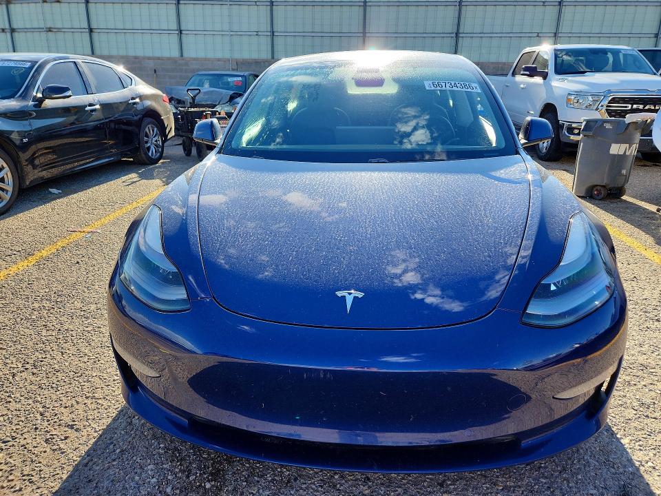 Продажа на аукционе авто 2021 Tesla Model 3, vin: 5YJ3E1EA5MF052852, номер лота: 66734386