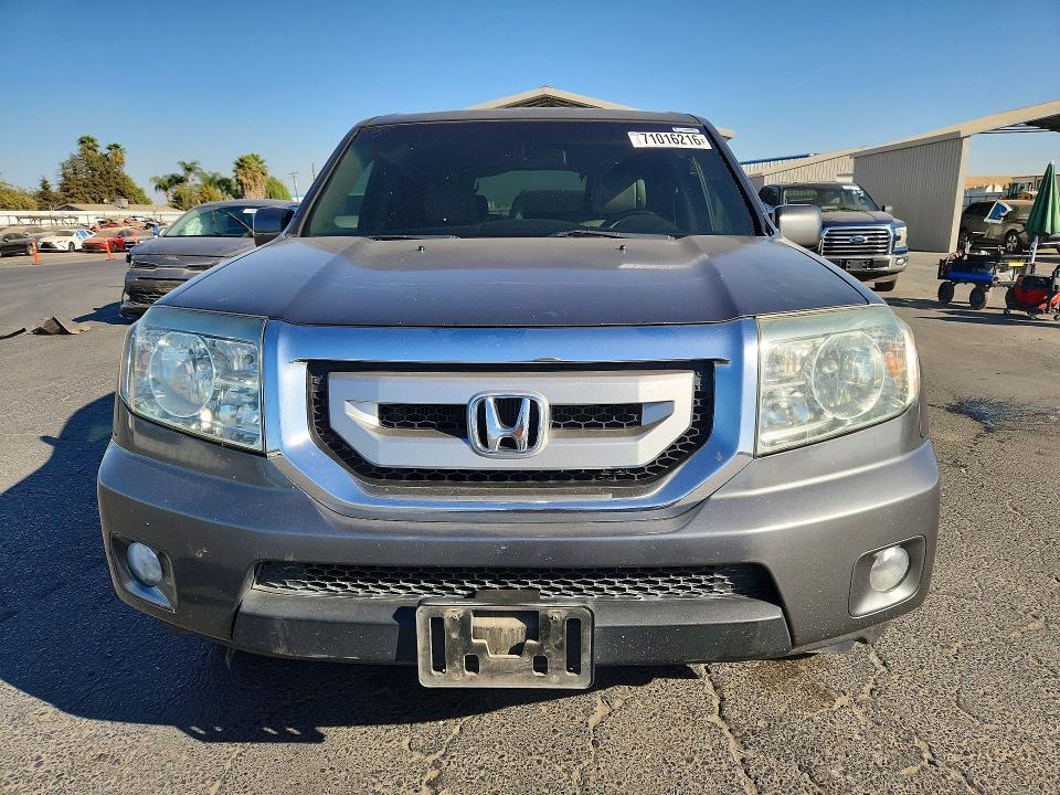 71016216 :رقم المزاد ، 5FNYF4H64BB007264 vin ، 2011 Honda Pilot مزاد بيع