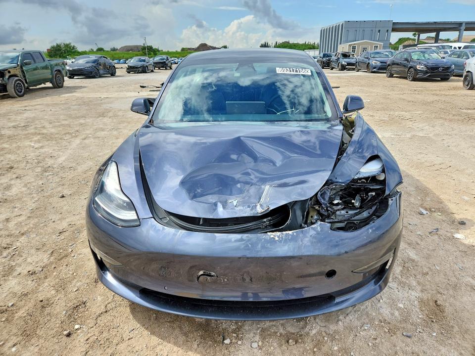 Продажа на аукционе авто 2022 Tesla Model 3, vin: 5YJ3E1EAXNF370306, номер лота: 69317156