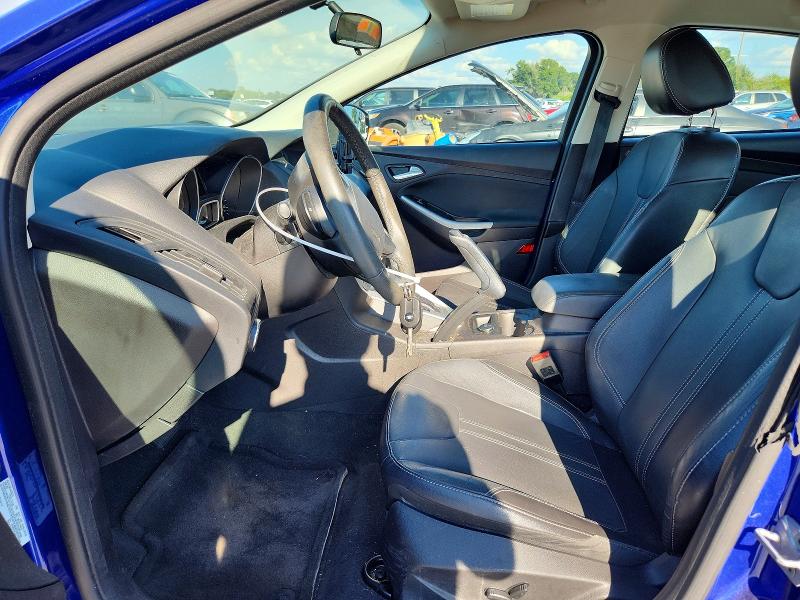 Auction sale of the 2014 Ford Focus, vin: 1FADP3F22EL165907, lot number: 70770116