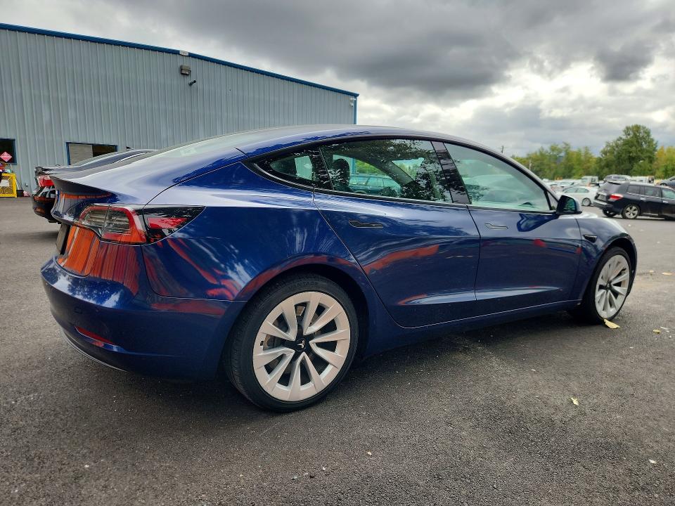 Продажа на аукционе авто 2022 Tesla Model 3, vin: 5YJ3E1EA1NF303884, номер лота: 69987436