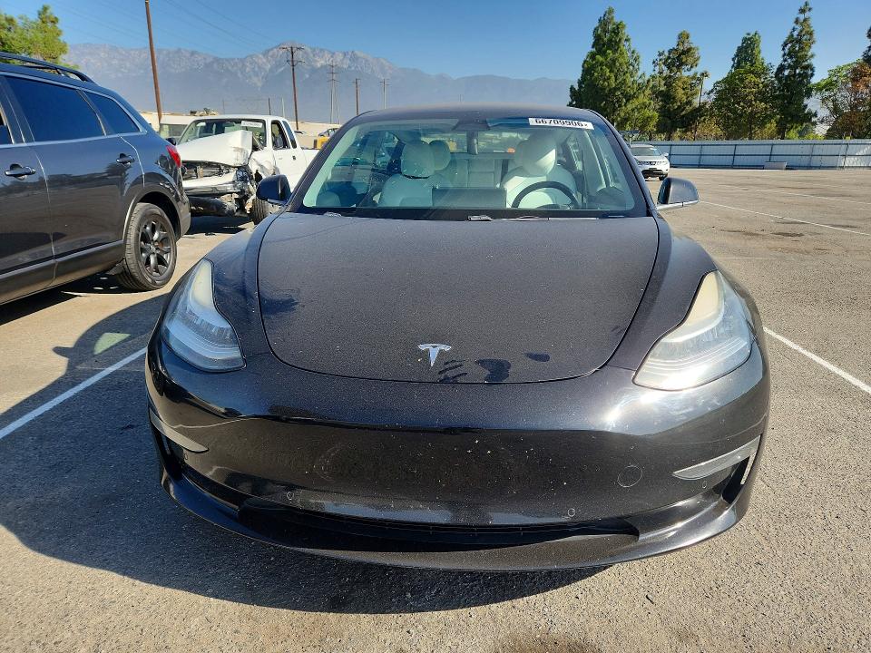 Продажа на аукционе авто 2018 Tesla Model 3, vin: 5YJ3E1EA4JF166305, номер лота: 66709906