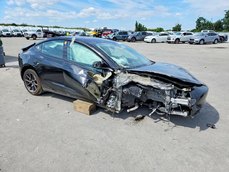 Продажа на аукционе авто 2023 Tesla Model 3, vin: 5YJ3E1EA3PF702945, номер лота: 70815116