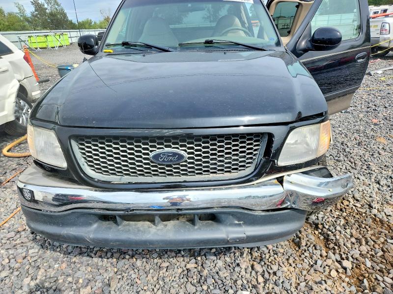 68799006 :رقم المزاد ، 1FTRX17W31KF03207 vin ، 2001 Ford F150 مزاد بيع