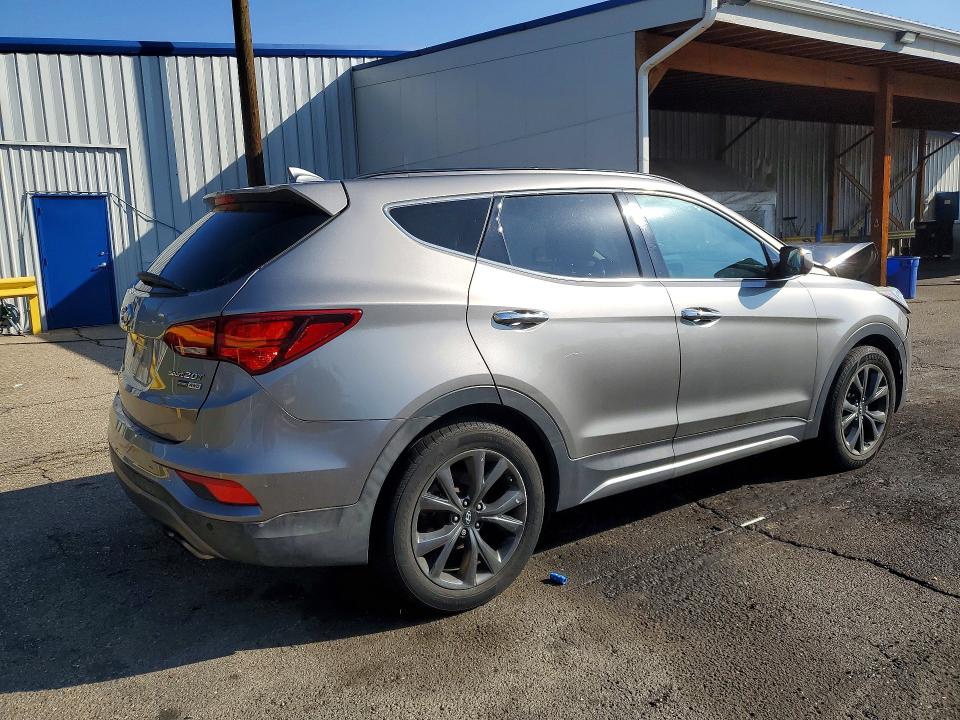2018 Hyundai Santa Fe Sport მანქანა იყიდება აუქციონზე, vin: 5NMZWDLAXJH103557, აუქციონის ნომერი: 69864696